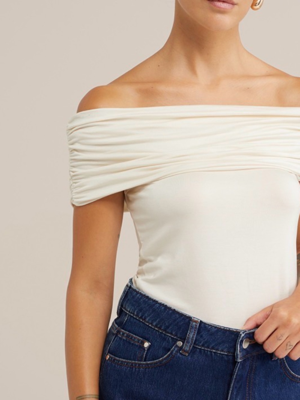 Dynamite Cream Off-the-Shoulder Draped Bodysuit with hidden sleeve